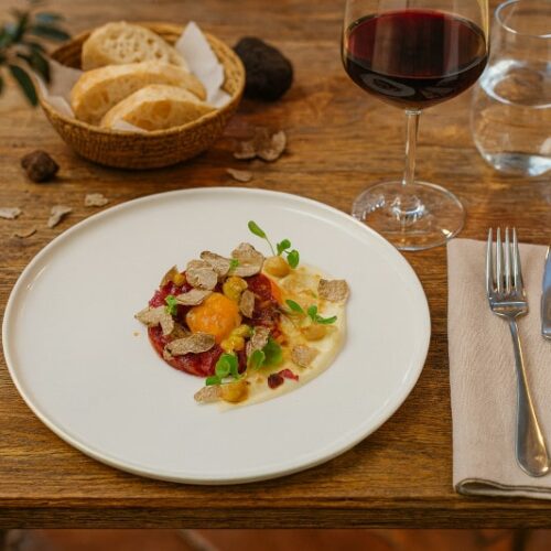 Wine with the meal Carne cruda all'Albese with Dolcetto d'Alba, Italian terrace, Mediterranean atmosphere