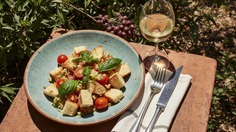 Wine with food Panzanella, Tuscan bread salad, Vernaccia di San Gimignano DOCG, garden, Mediterranean summer table