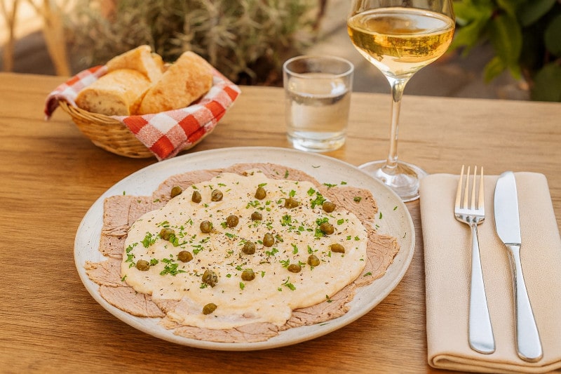 Wine with dinner Vitello Tonnato with Gavi di Gavi, summer table, Italian atmosphere